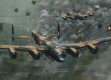  Lancasters of No.15 Squadron are shown releasing their bombs during the attack against German armour that had amassed in and near the French village of Villers Bocage on 30th June 1944. ED395 (LS-M), piloted by Fl Off W Hall, is in the background with LM473 (LS-P) in the foreground, flown by Fl Sgt N Overend. The village was almost completely obliterated during the bombing raid and the operation was deemed a tactical success.