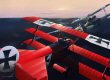  Credited with no fewer than 80 victories, Manfred Von Richthofen, The Red Baron, became legendary, not least for the 17 kills scored whilst flying the diminutive Fokker DR1 Triplane.  Contrary to popular belief, however, only one of his aircraft is known to have been painted all red. Serial no. 477/17 is shown here dicing with an SE5. 